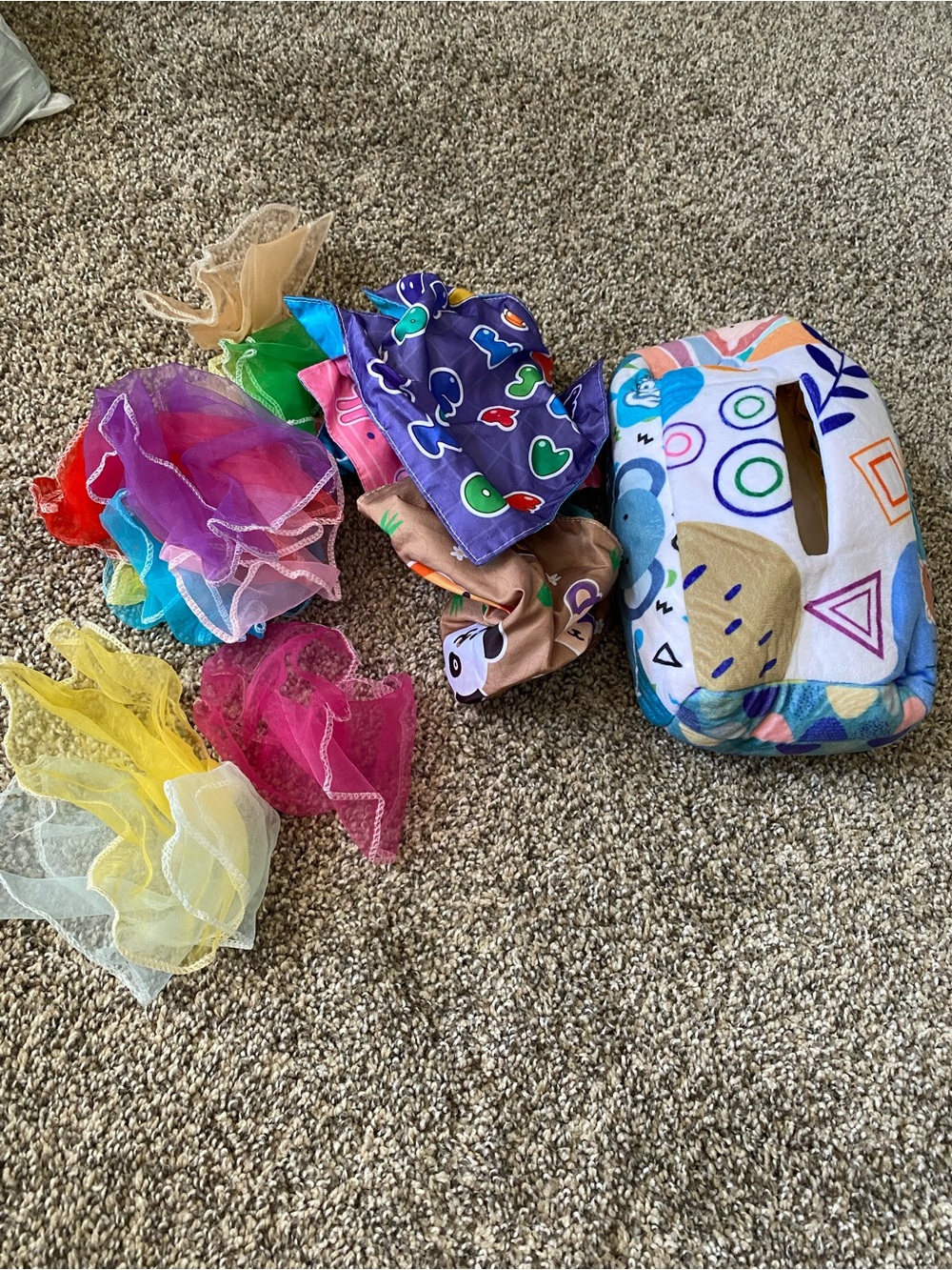 Baby sensory tissue box toy with tissues